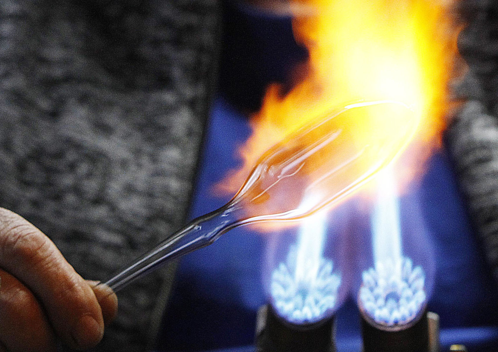 Shaping hot glass into ornament